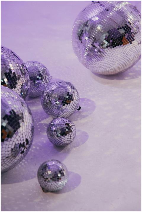A collection of disco balls casting reflections on