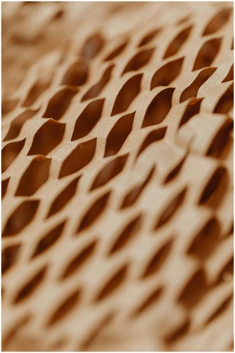Detailed view of a honeycomb textured cardboard pa