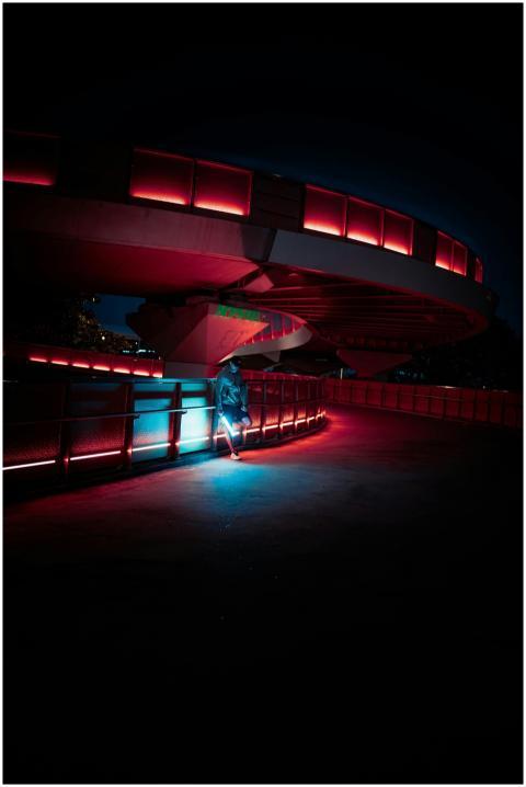 Futuristic night scene with vibrant red and blue l