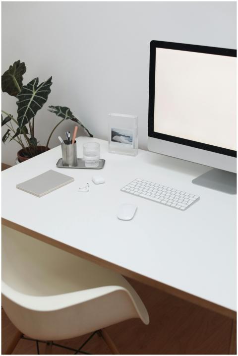 Sleek and modern home office desk featuring a comp