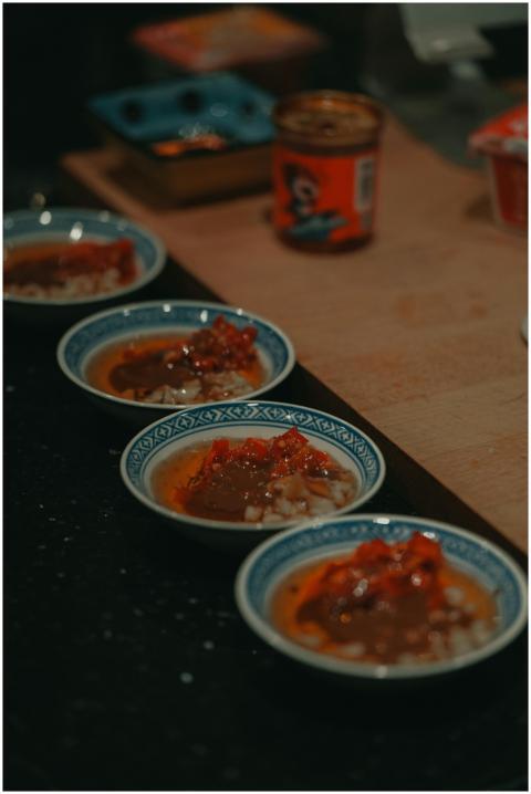 A set of flavorful Chinese sauces arranged in trad
