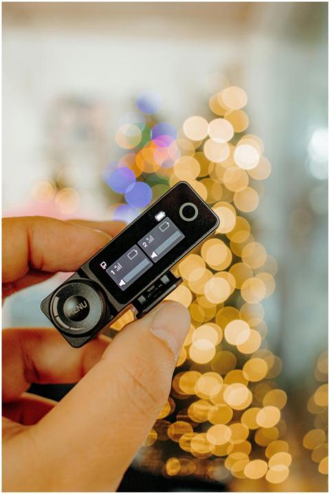 Hand Holding Digital Device