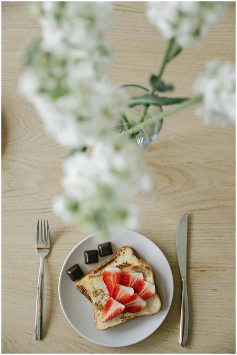 Appetizing breakfast of toast with fresh strawberr