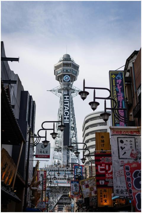 View of Tsutenkaku Tower, Osaka, amidst vibrant st