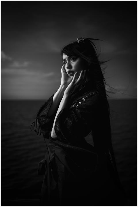 Captivating black and white portrait of a woman wi