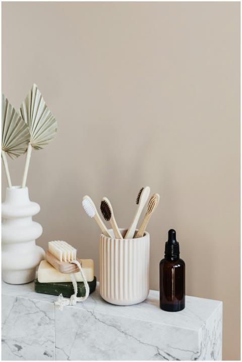 Collection of bamboo toothbrushes and organic natu