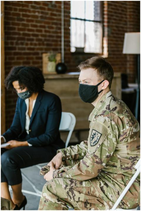 A soldier receives counseling in a therapy session