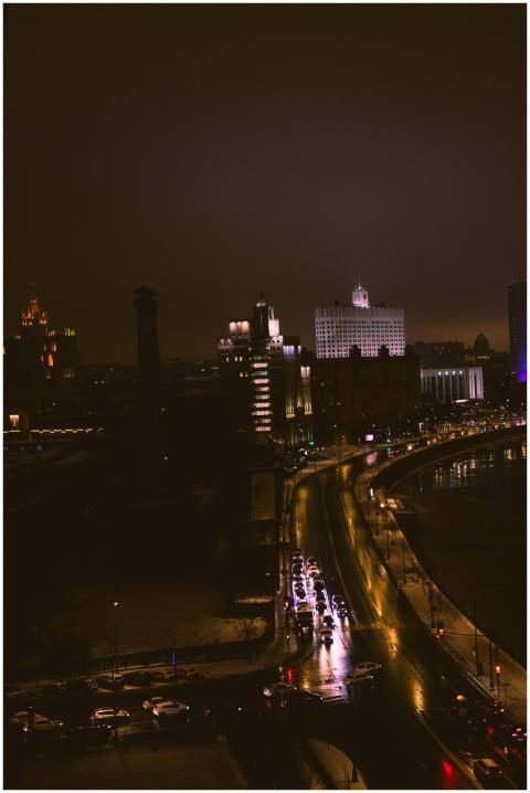 A dramatic view of an urban street at night, showc