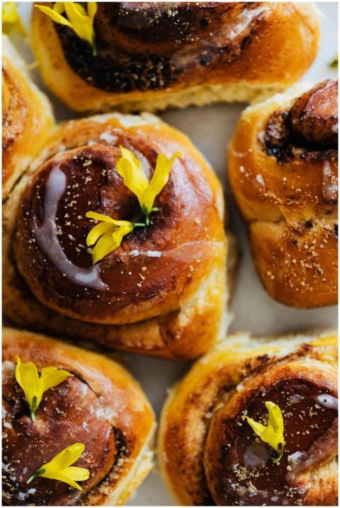 Delicious homemade cinnamon rolls adorned with yel