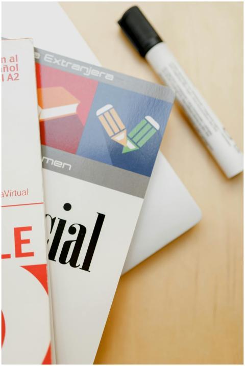 Close-up shot of Spanish language books and a mark