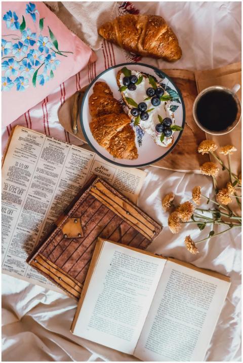 Top view of a cozy breakfast scene with croissants