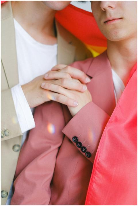 A heartfelt moment as a couple holds hands, symbol