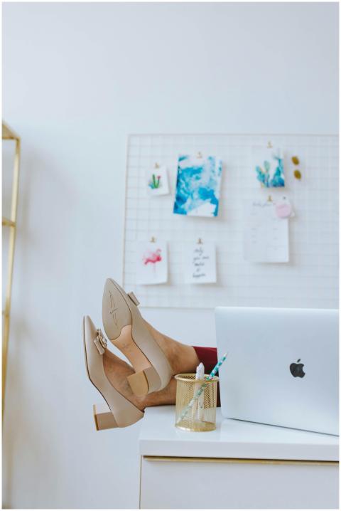 Cozy home office scene with feet up, showcasing re