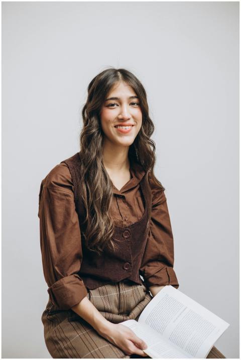 Portrait of a young brunette woman elegantly dress