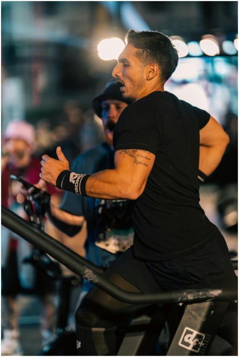 Fit man exercises on treadmill during an energetic