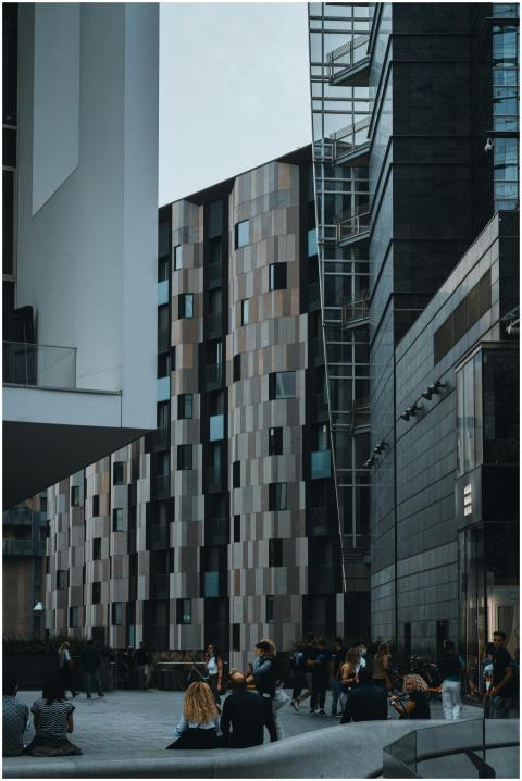 A bustling urban scene featuring contemporary buil