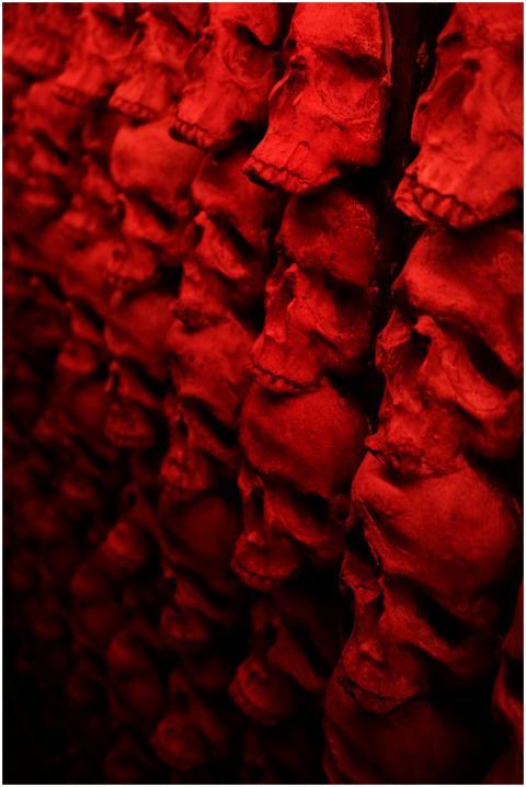 Creepy red skull wall creates a haunting Halloween