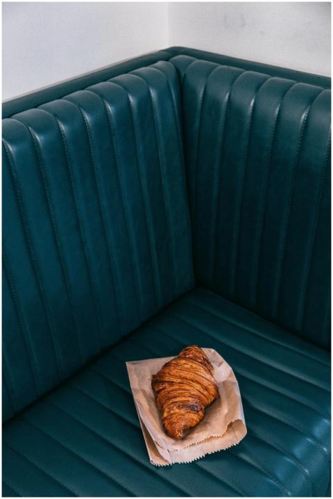 From above of appetizing crispy French roll made o