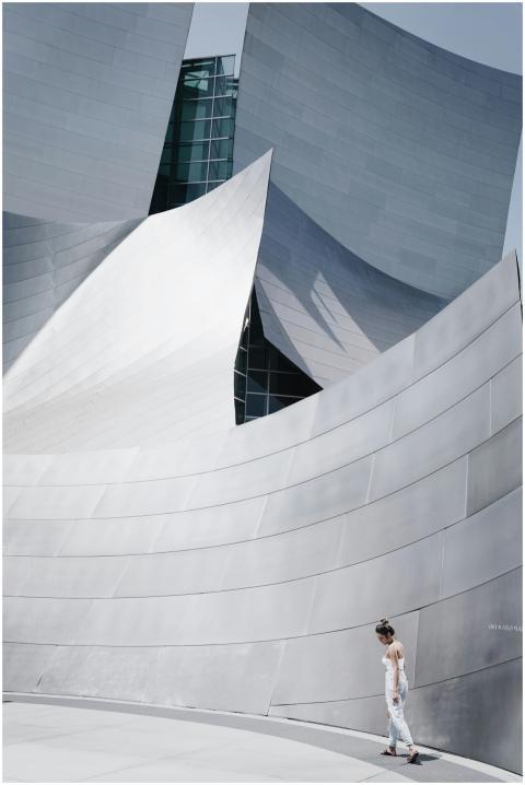 Sleek metallic architectural structure with a lone