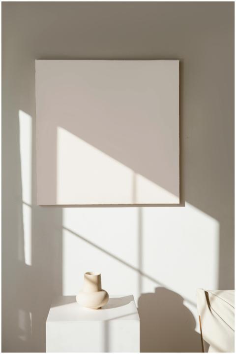 A serene minimalist art exhibit featuring an empty