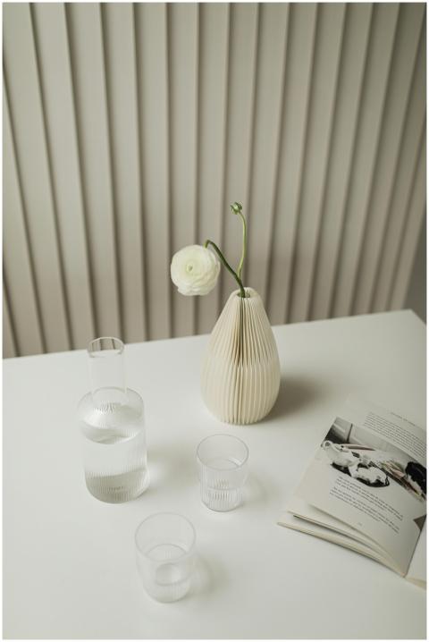 Modern minimalist table setting with glassware and
