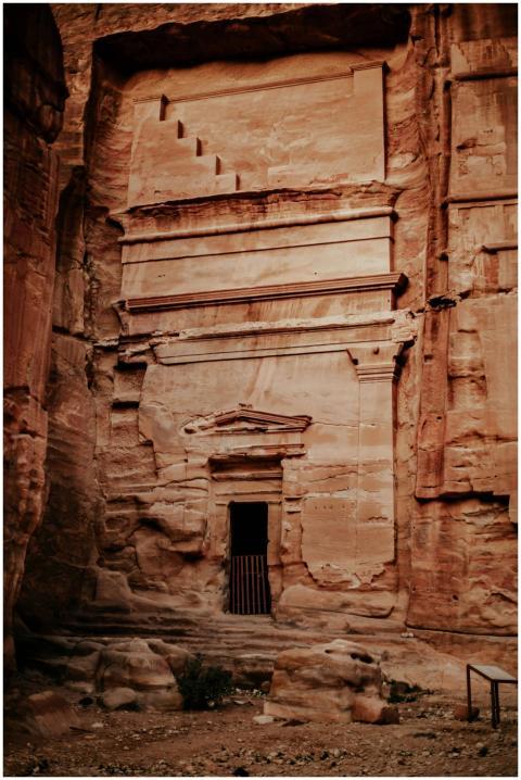 An ancient carved stone entrance in a historical r
