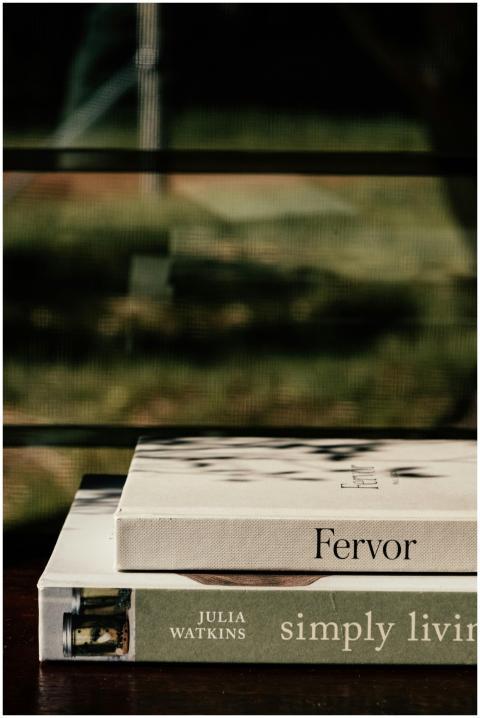 Aesthetic display of stacked books creating a cozy