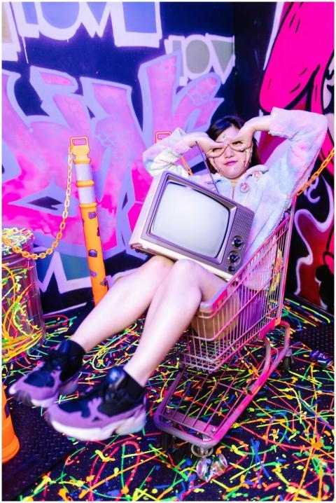 A playful urban setting featuring a woman in a sho