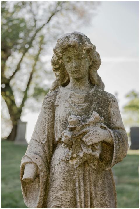 A detailed marble statue in a green park, showcasi