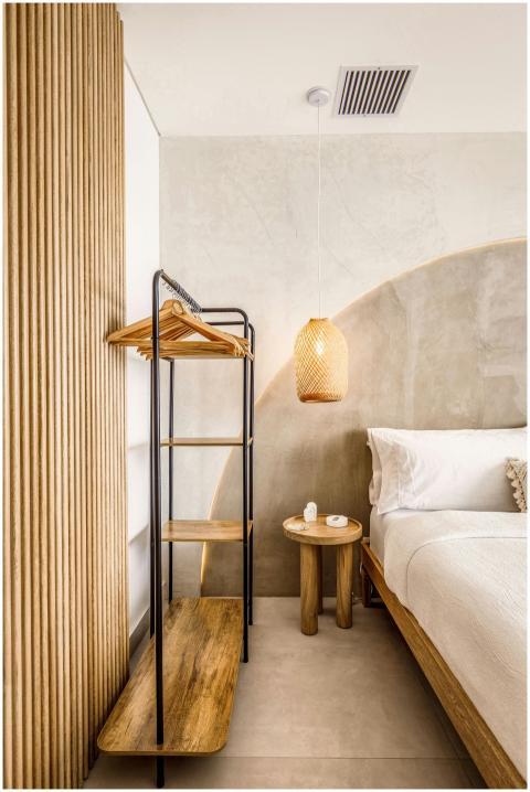 Bright and stylish minimalist bedroom interior wit