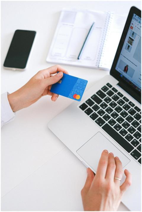 Person making an online purchase with a credit car