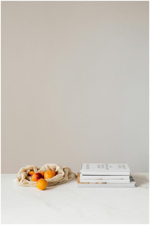 Composition of canvas bag with fresh ripe apricots
