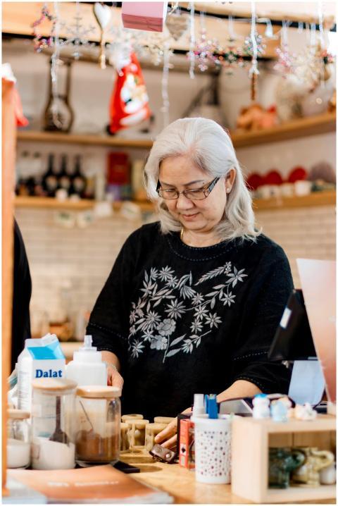 Elderly Woman Crafting Cozy