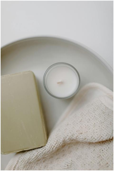 Elegant minimalist arrangement of soap, candle, an