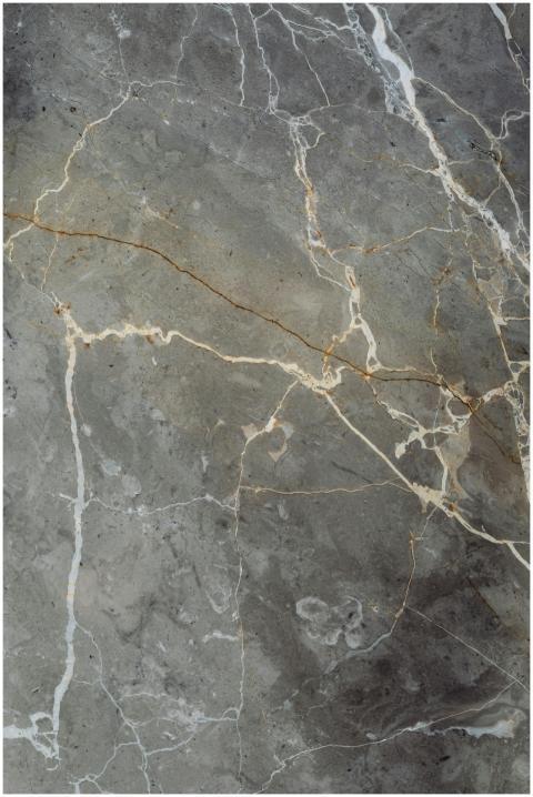 Close-up of a grey marble surface showcasing intri