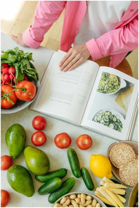 Overhead view of fresh vegetables and an open cook