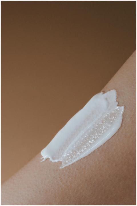 A detailed view of moisturizing cream applied on s