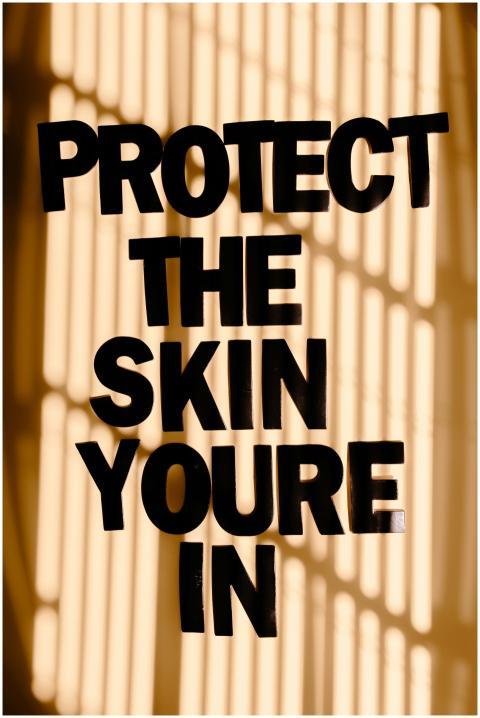 Inspirational poster emphasizing skin protection w