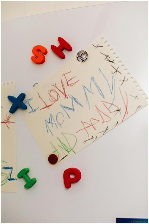 A child's crayon drawing expressing love for paren