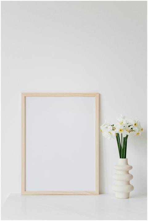 Elegant room decor with daffodils in a vase and a