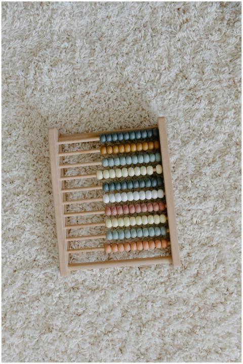 Aesthetic close-up of a colorful wooden abacus on