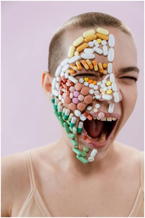 Artistic expression using colorful pills on a pers