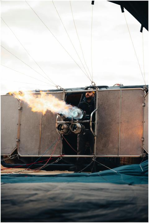 Hot air balloon preparation with flame in Ürgüp, T