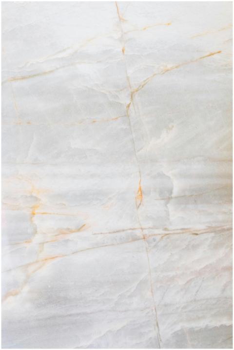Close-up of a smooth marble surface featuring intr