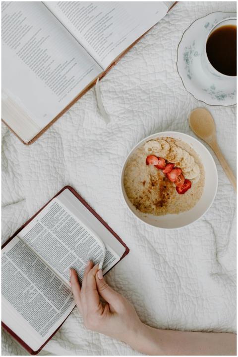 Top view of a morning routine with Bible reading,