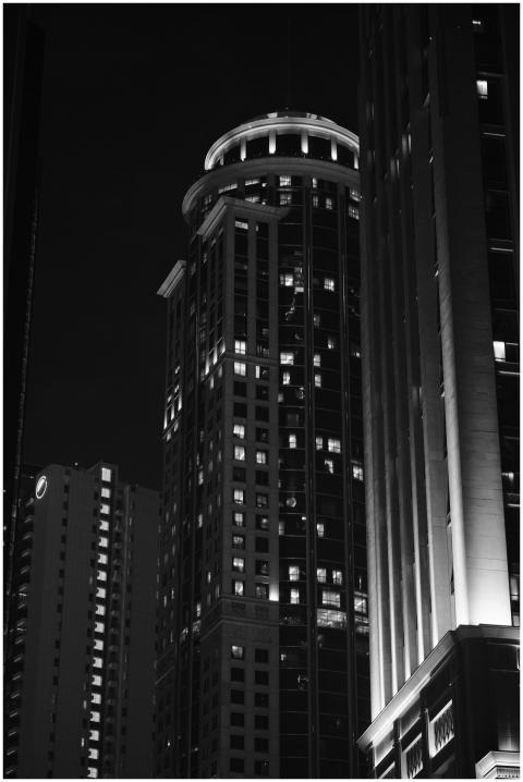 Black and white image of Doha skyscrapers at night