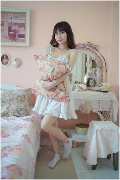 Young Woman Cozy Bedroom