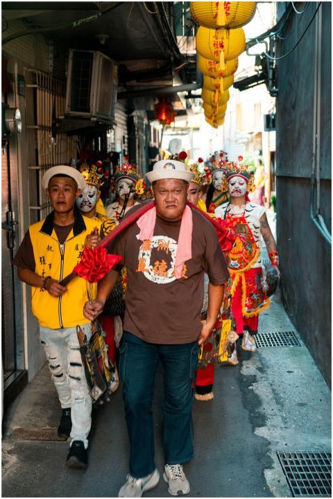 Colorful procession featuring traditionally dresse
