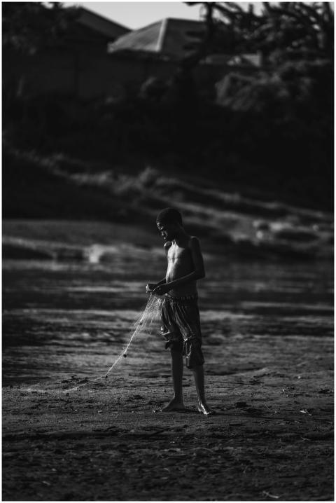 Free stock photo of african boy, boy fishing, fish