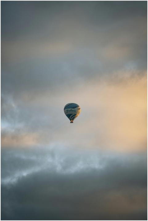 Tranquil hot air balloon floating in Cappadocia's